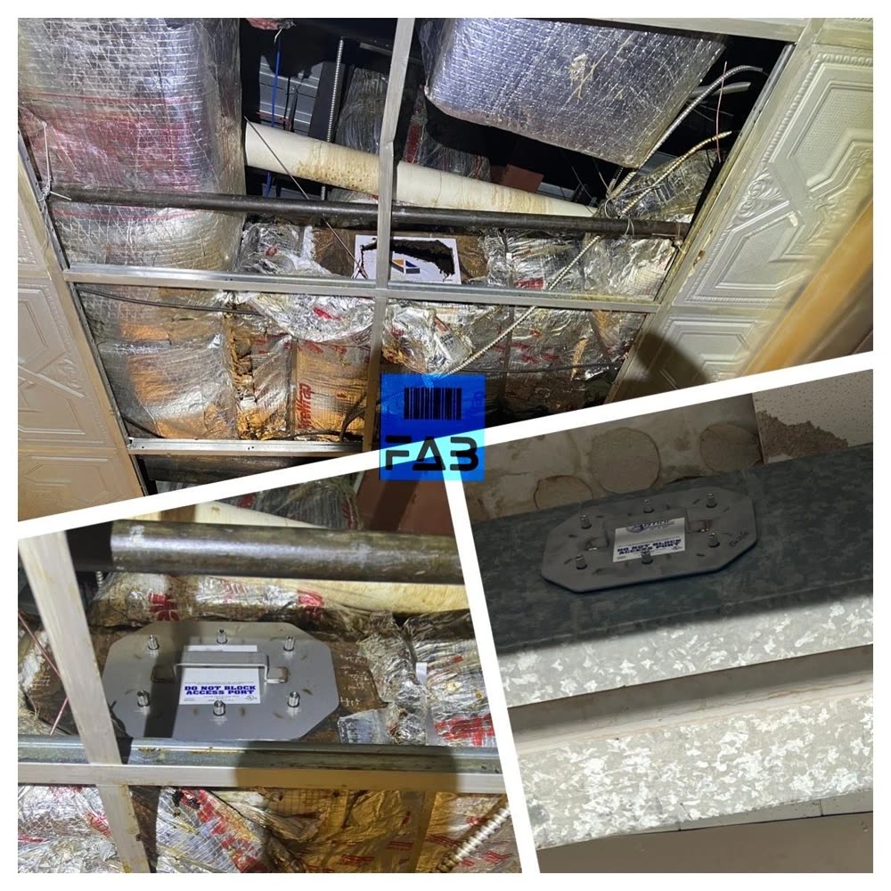 A newly fitted access door on grease-laden ceiling ductwork