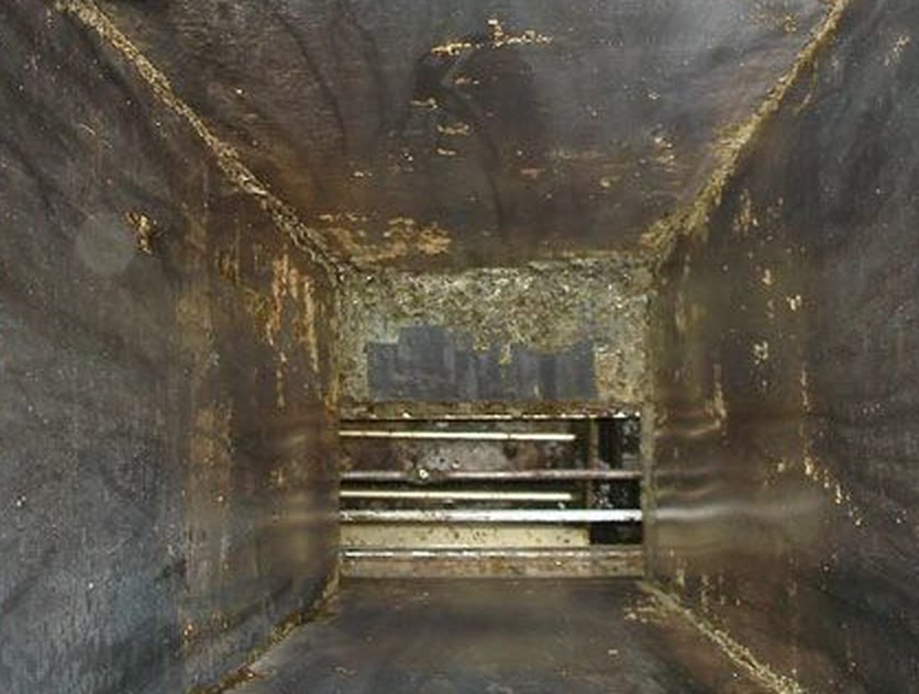 The same duct after cleaning, bare metal walls